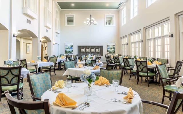 Dining area set up for a meal with elegant decor