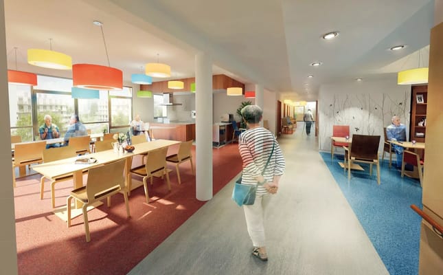 Interior scene of a bright, modern common area with residents