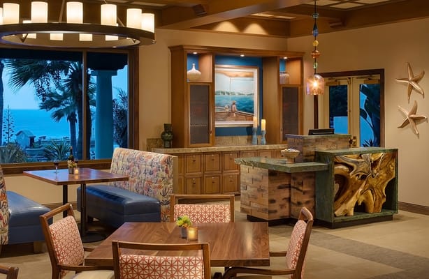 Interior common area with seating and ocean view