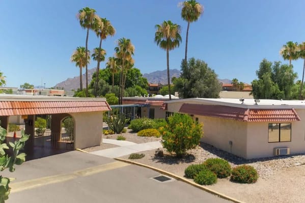 Aerial view of the assisted living facility with palm trees