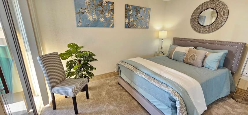 Cozy resident room with comfortable bed and decor