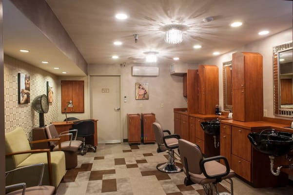 Interior view of a hair salon with styling chairs