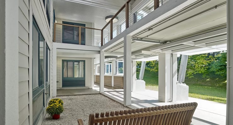 Covered outdoor seating area near the main entrance