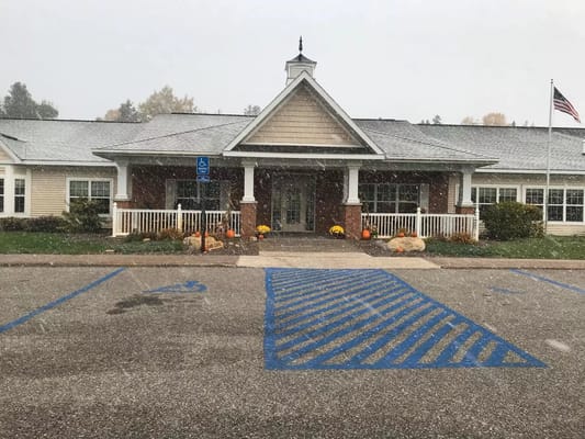 Entrance of Cedar Cove Assisted Living during snowfall