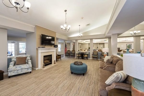 Comfortable common area with seating and fireplace