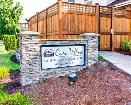 Entrance sign for Cedar Village Assisted Living