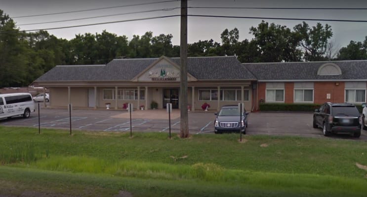 Exterior view of CedarWoods Assisted Living facility