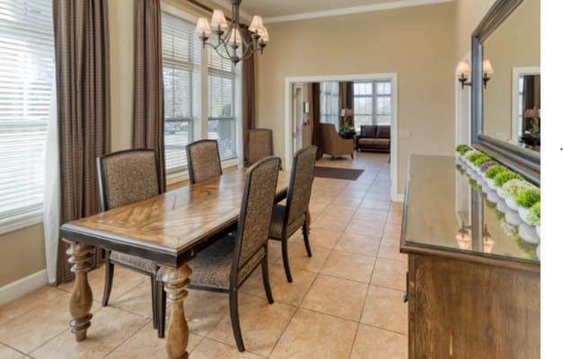 Modern dining area with table and chairs