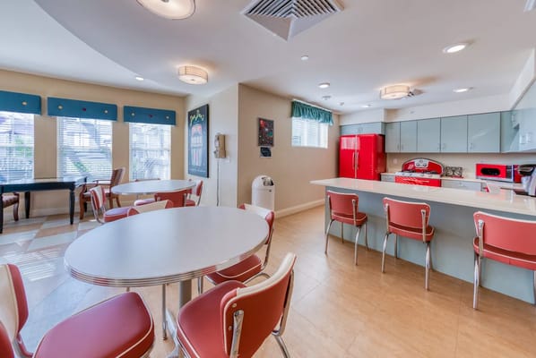 Bright common area with modern furnishings and appliances