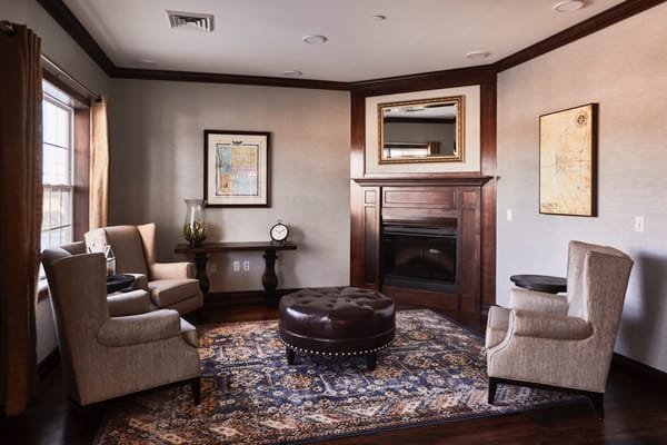 Cozy common area with a fireplace and seating