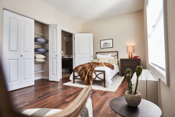 Cozy resident room with a bed and closet space