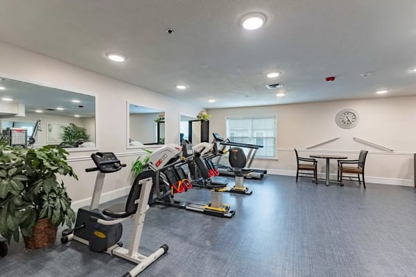 Fitness area with exercise machines and seating