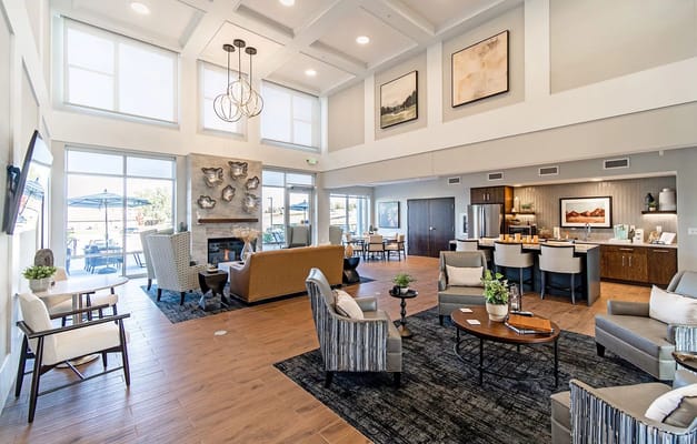 Bright, spacious common area with seating and decor