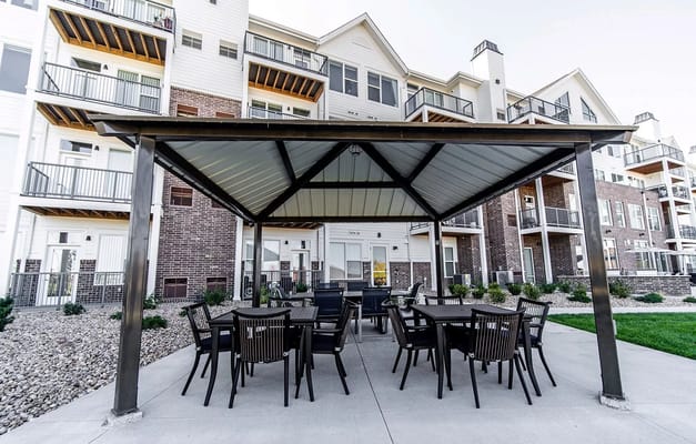 Outdoor seating area with gazebo and tables