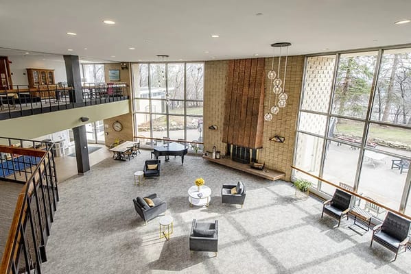 View of the spacious lobby with seating and large windows