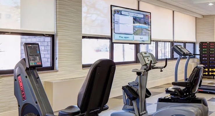 Interior view of a fitness area with exercise equipment
