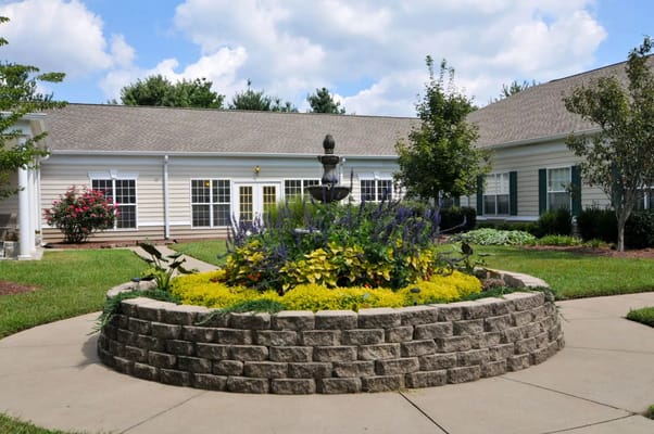 Beautifully landscaped courtyard with a fountain