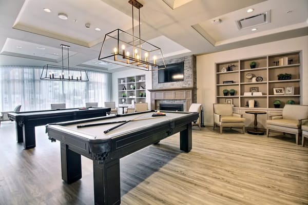 Interior common area with pool tables and seating