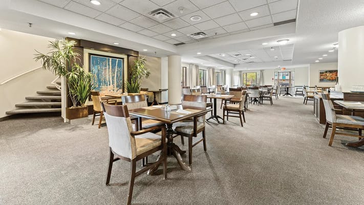 Bright dining room with tables and chairs