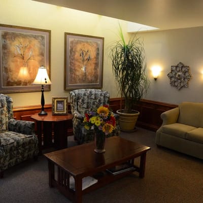 Elegant lobby with comfortable seating and floral decor