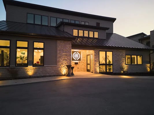 Exterior view of Chevy Chase Gardens facility at dusk
