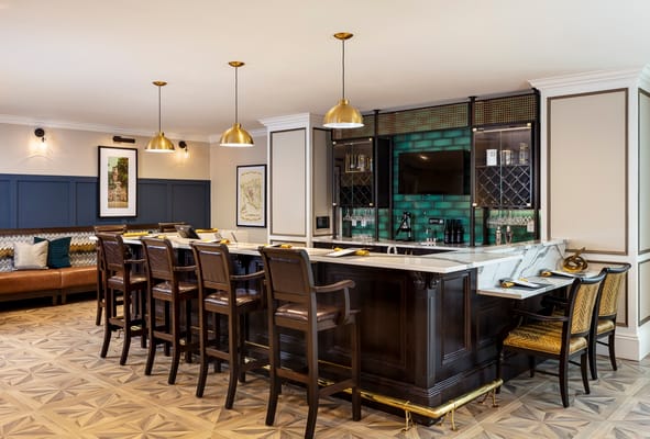 Interior view of a stylish dining area with bar seating