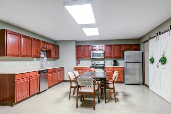 Bright kitchen area with modern appliances