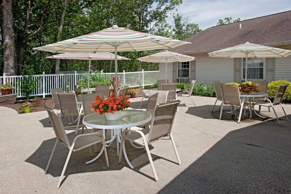 Outdoor patio area with seating and umbrellas