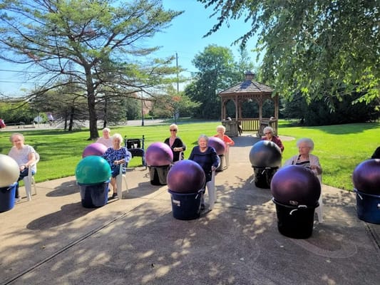 Residents engaging in an outdoor fitness activity