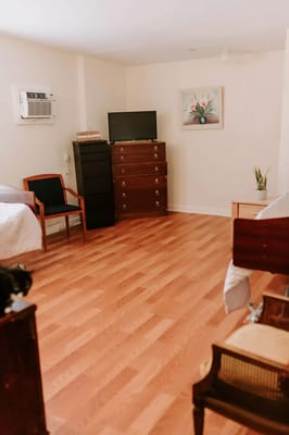 Cozy interior of a resident room with furniture