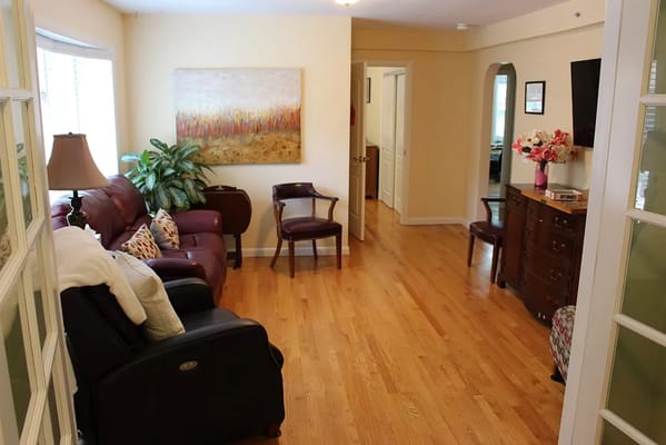 Cozy living room area with seating and natural light
