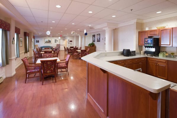 Interior view of a common area with seating and tables