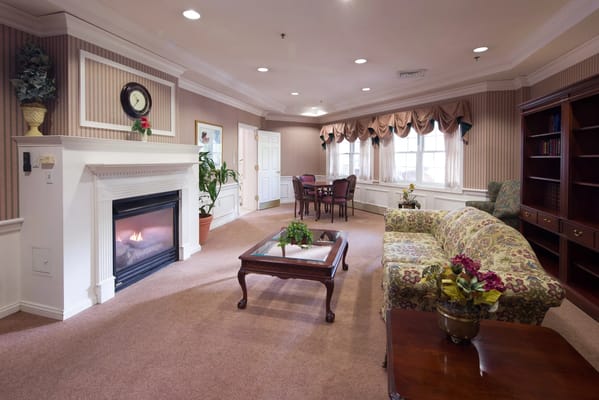Cozy common area with a fireplace and seating