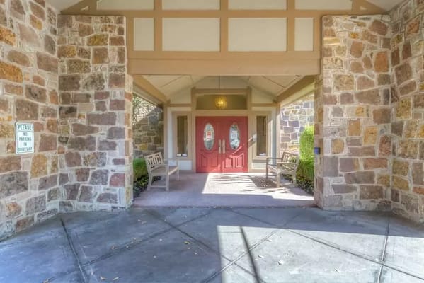 Entrance of the facility with stone architecture