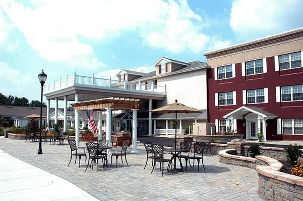 Outdoor seating area with building in the background