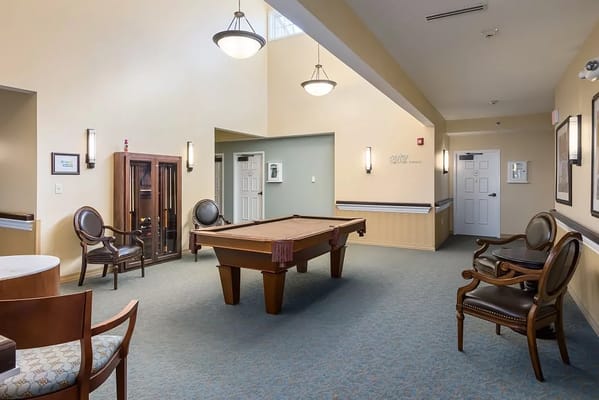 Interior common area with a pool table and seating
