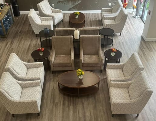 Common area with comfortable seating and tables