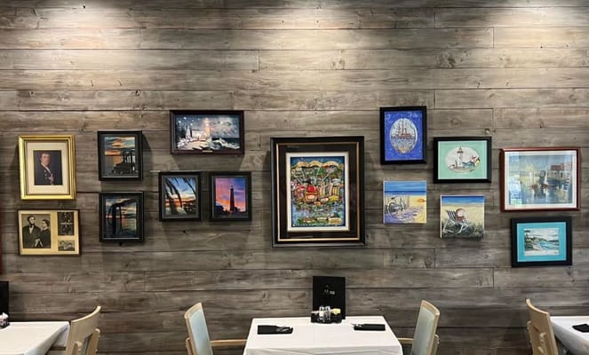 Artwork displayed on a dining room wall