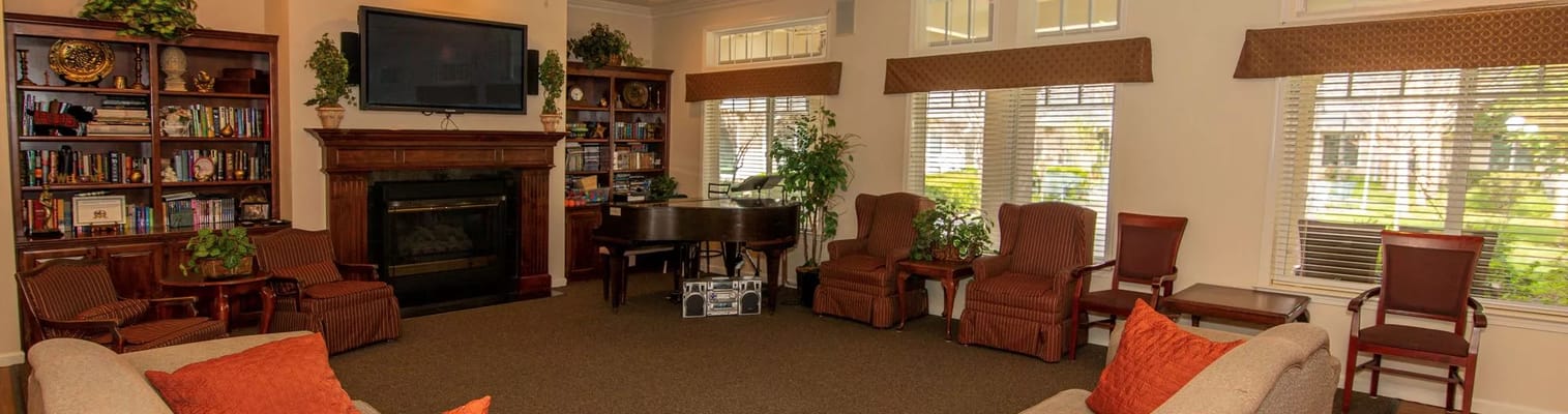 Cozy common area with seating and piano
