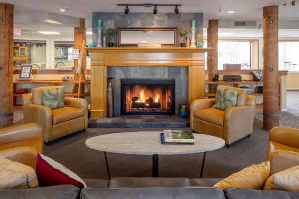 Cozy common area with a fireplace and seating