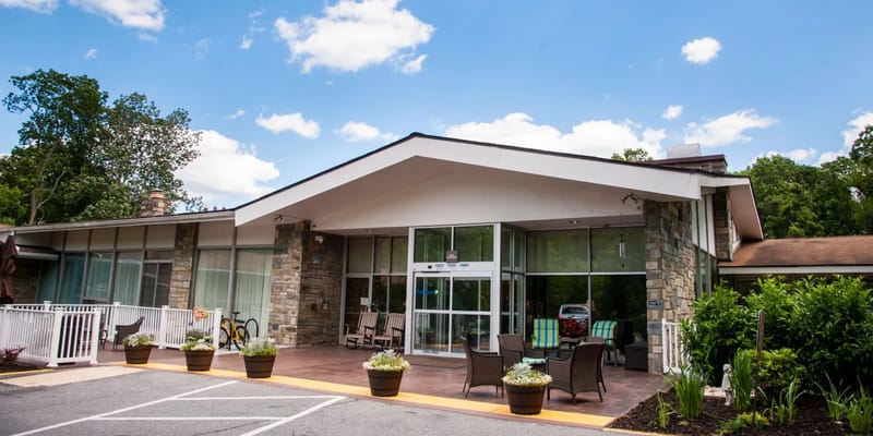 Exterior view of Crescent Cities Center with seating area