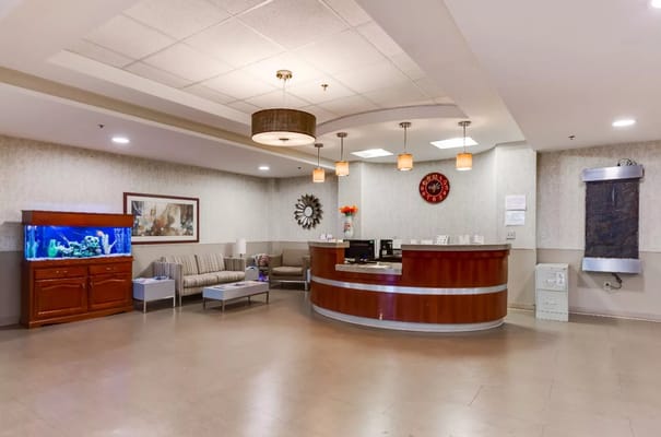 Interior view of a nursing home reception area with seating