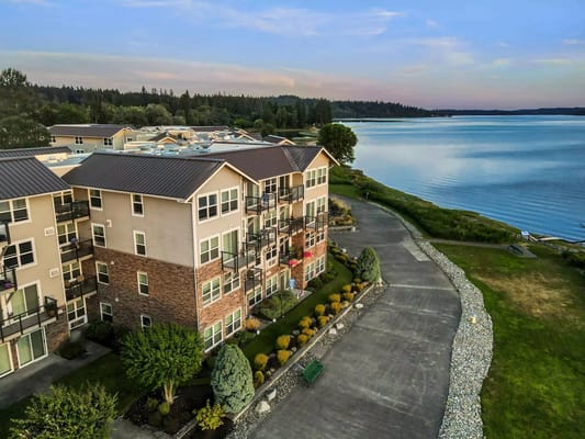 Aerial view of Crista Shores senior living facility by the waterfront.