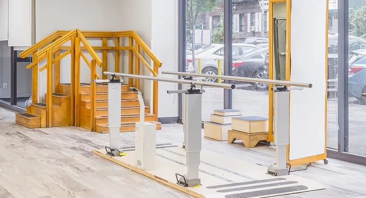 Rehabilitation space with parallel bars and stairs