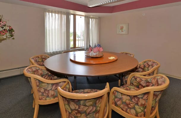 Interior view of a common area with a round table
