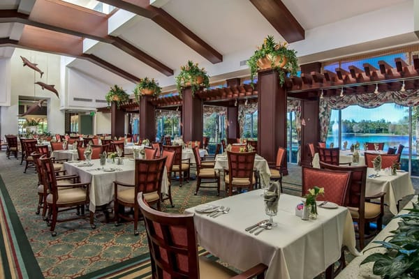 Elegant dining area with tables set for residents