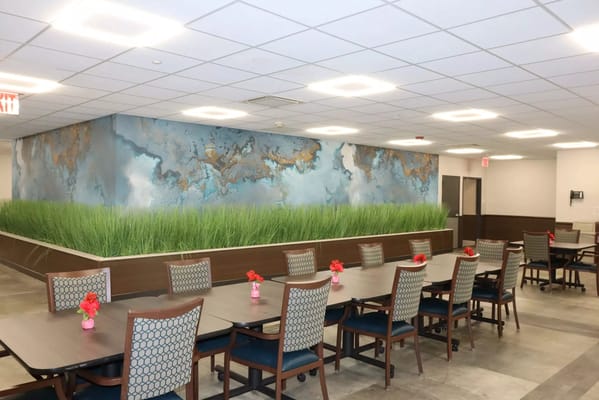 Dining area with tables and colorful decor