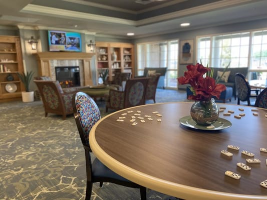 Interior common area with seating and games set up