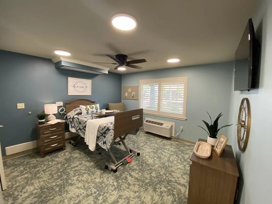 Private resident room with modern decor and bed