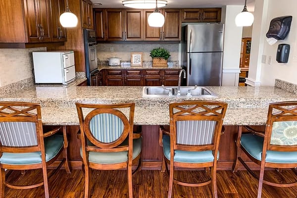 Bright kitchen with a large counter and seating